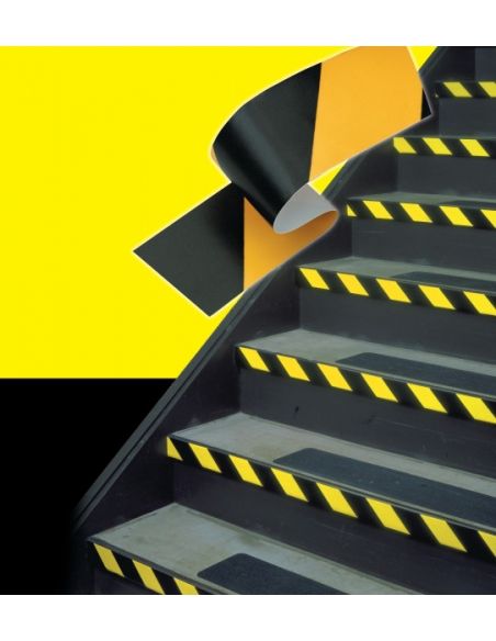 Scotch vinilico 3M 766 giallo e nero applicato su gradini per segnalazione di sicurezza.